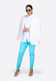 Model wearing tailored white linen blazer, front view – East Vibe